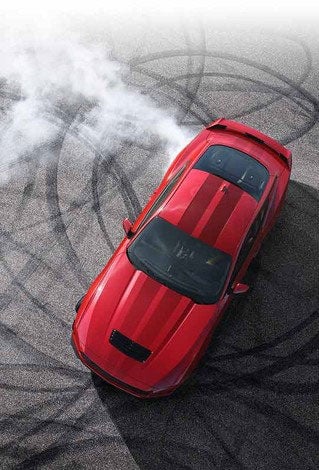 Overhead view of a 2024 Ford Mustang® model with tire tracks on pavement | Donley Ford of Ashland, Inc. in Ashland OH